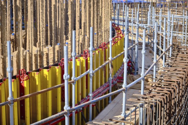 Vertical panel formwork and scaffoldings of reinforced concrete walls under construction.