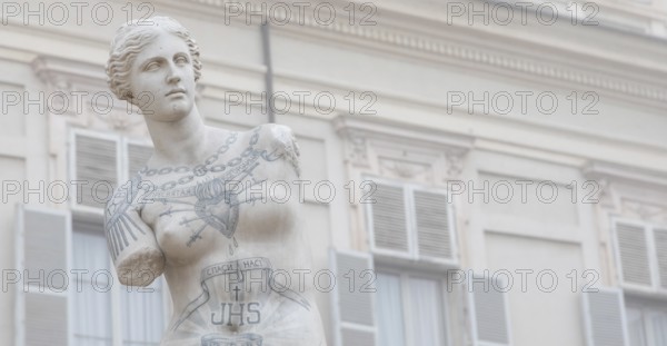 Turin, Italy, Circa January 2022: Venus de Milo with tattoos by Fabio Viale. White marble and