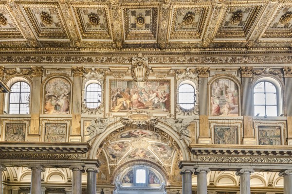 Coffered ceiling of the right aisle with a view into the domed chapel of the capella sistina of the