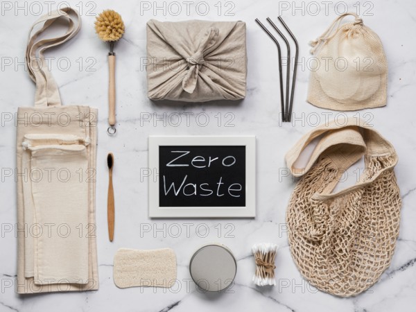Zero waste concept. Textile wrapping gift, eco bags, metal straws, eco-friendly kitchen tools,