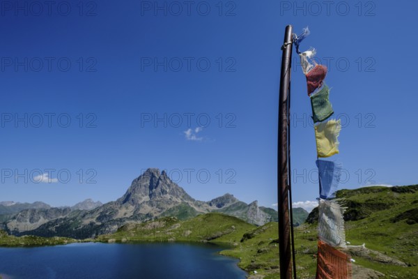 People on Ayous hut, Gentau lake, Ayous lakes tour, Pyrenees National Park, Pyrenees Atlantiques,