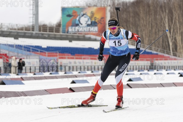 Sportswoman biathlete Eremeeva Elizaveta Kamchatsky Krai skiing on distance biathlon complex. Open