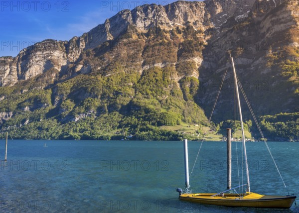 Image taken in the Murg Ost village, Switzerland, presenting a small boat on the Walensee lake in