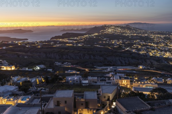 Evening mood after sunset, view from Pyrgos to Fira, Archipelago of Santorini, Cyclades, Greece