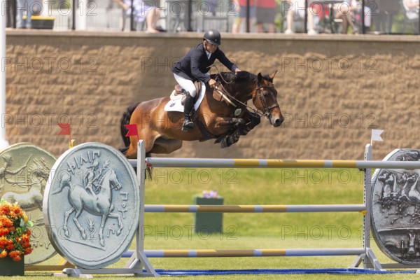 Will Simpson of the United States and riding Imar, compete in the 1.60m Grand Prix during The