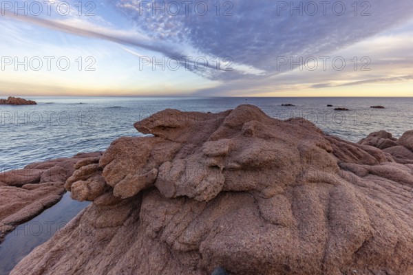 Coastal landscape with bizarre red rocks and sea view, Spiaggia di Cala E'Luas, Ogliastra,