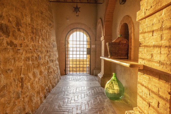 Beautiful sun light inside of an ancient castle near Montalcino, Tuscany, Italy. Old stone medieval