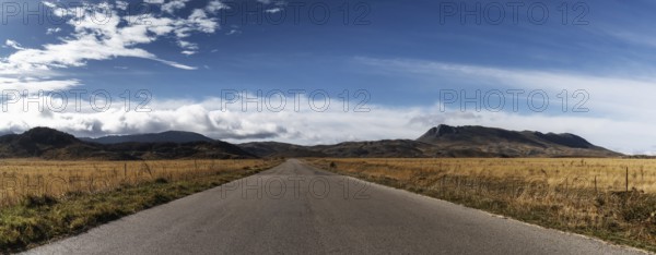 A country highway leading into the distance in the Gran Sasso and Monti della Laga National Park in
