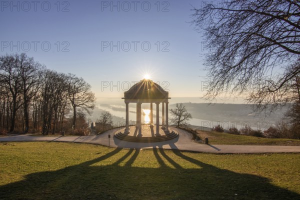 Beautiful temple in a landscape shot. Sunrise on a winter morning. Beautiful view along the Rhine
