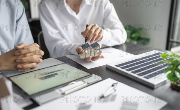 Solar panels green energy Business man working green eco friendly office business creative idea