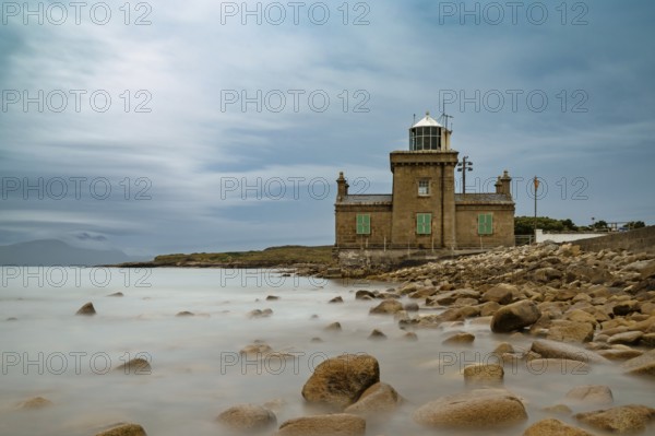 A long exposure view of the historic 19th-century Blacksod Lighthouse on the Mullet Peninsula in