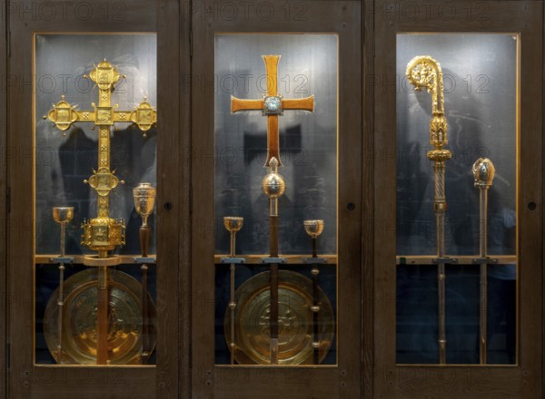 Chester, United Kingdom, 26 August, 2022: ornate golden crosses and Bishop staff in a display case