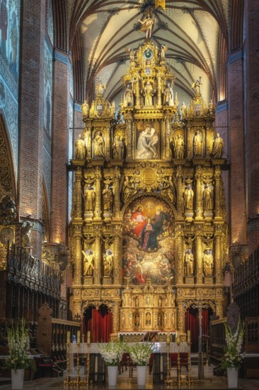 Closeup on amazing, golden and ornate altar of Church of the Assumption of the Blessed Virgin Mary,