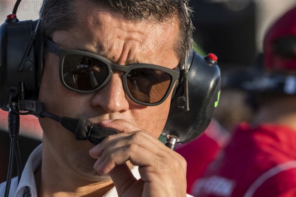 NTT INDYCAR SERIES team owner, RICARDO JUNCOS, watches as his teams prepare for the Bommarito