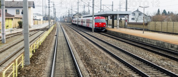 Austria, Upper Austria, Linz, Wels . Railway tracks seen from a moving train between Linz and Wels