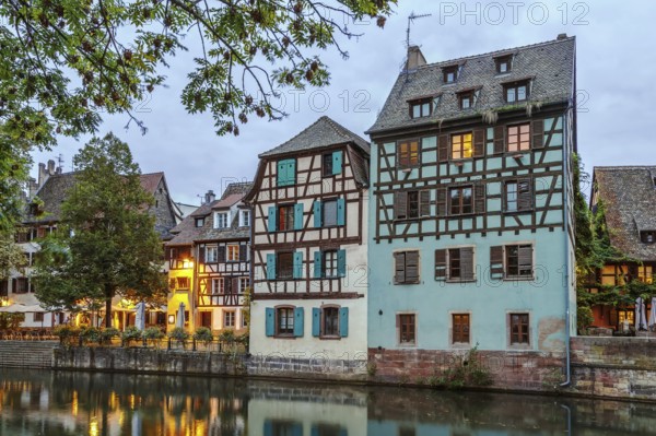 Historic houses on the embankment of the Ill river in Petite France district in Strasbourg, France.