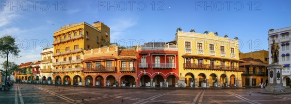 Panorama of an ensemble of colorful historic buildings on a sunny day in Cartagena, Colombia,