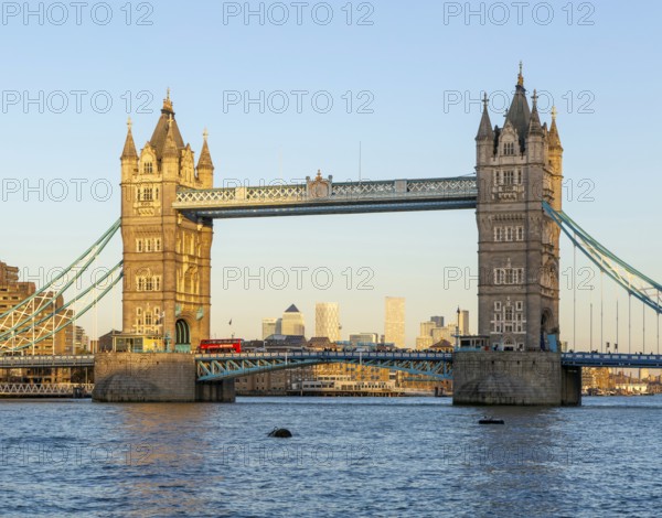Tower Bridge in sunshine at dusk, River Thames from Southwark, London, England, UK