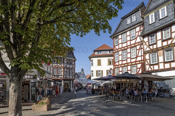 Shops, shops, street cafés, half-timbered houses, busy shopping street, Weiseler Strasse, old town