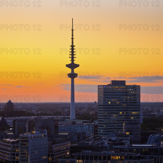 City view from above with the Heinrich-Hertz-Tower at atmospheric sunset, Hamburg, Germany