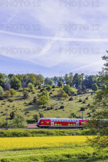 RegionalExpress RE5 to Friedrichshafen travelling over the Swabian Alb. Idyllic landscape near