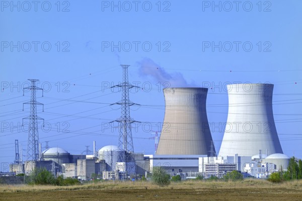 Cooling towers of the Doel Nuclear Power Station, nuclear power plant and high-voltage electricity