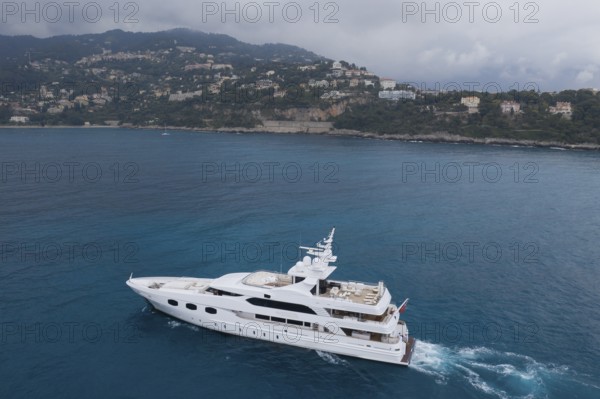 Aerial view 51 metre motor yacht ELENI cruising between Cap Martin and the Principality of Monaco,