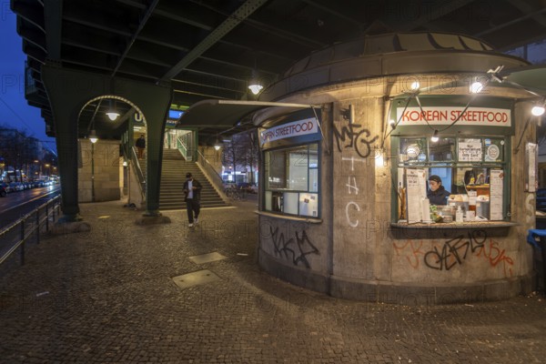 Germany, Berlin, 03.12.2024, snack bar, Korean street food, under the underground viaduct