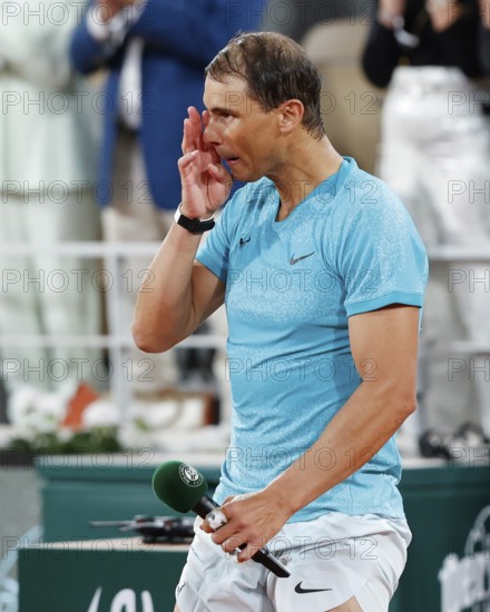 Emotional Rafael Nadal iholding speech after his early loss at the French Open, Roland Garros,