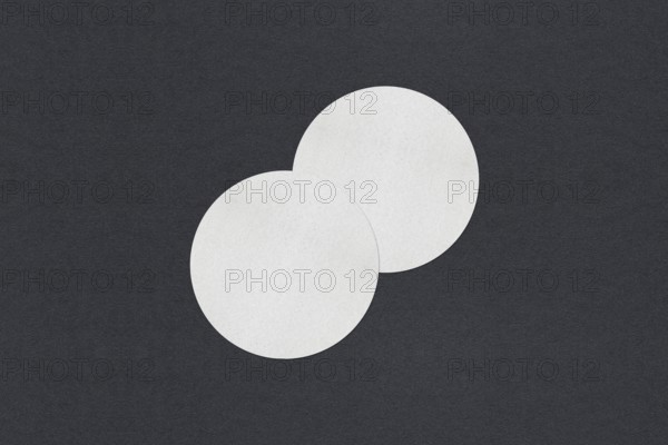 Two overlapping textured white circles on a dark background, minimalistic art, Blank white Business