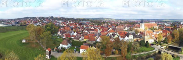 This aerial photo shows the picturesque town of Herrieden. At the centre are the red roofs of the