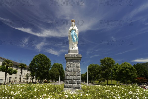 Statue of the Crowned Madonna of Our Lady in Lourdes on Rosary Square in the Marian pilgrimage town