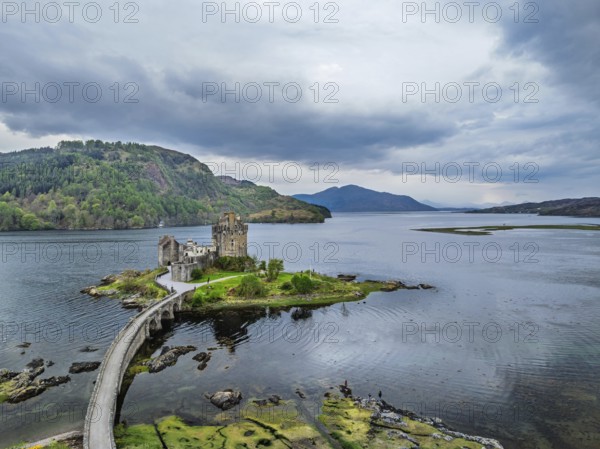 Eilean Donan Castle and Loch Duich from a drone, Isle of Skye, Highlands, Scotland, England, United