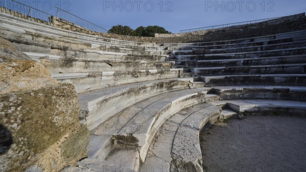 ©Udo Rein, Detailed view of a stone amphitheatre with focus on the curved rows of seats, Ancient
