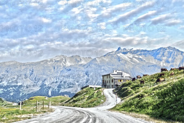 Photo with reduced dynamic saturation HDR of south ramp ascent from pass road to mountain pass