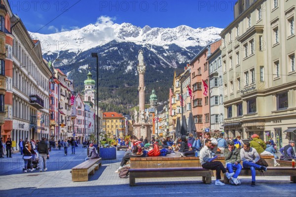 Pedestrian zone Maria-Theresien-Strasse with the Annasäule in front of the Nordkette of the