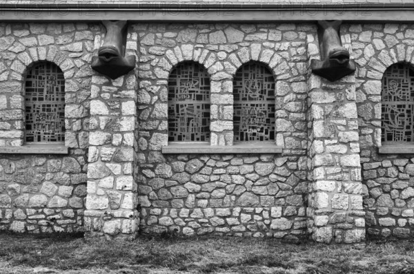Side view, decorations, fish heads as gargoyles, church Chapelle Notre Dame de la Garde, black and
