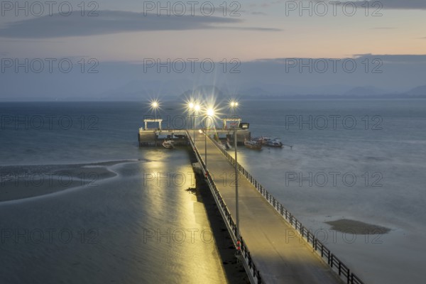 Illuminated jetty at night, harbour at Sivalai Beach, Koh Mook Island, Satun Province, Southern