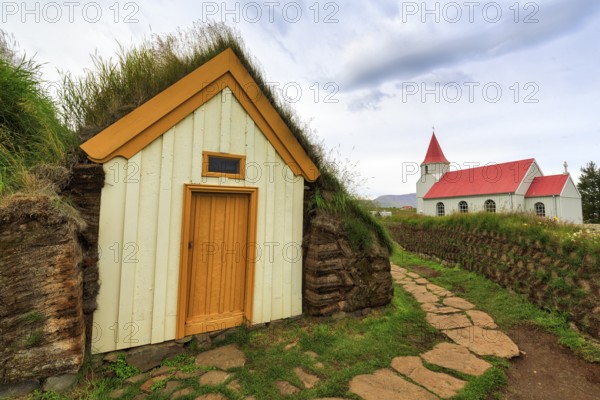 Grass sod houses and church, green roofs, peat farm or peat museum Glaumbaer or Glaumbær, open-air