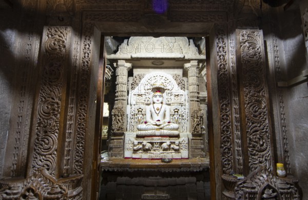 White marble statue of Mahavira in the Jain temple Chandraprabhu in the fortress in Jaisalmer,