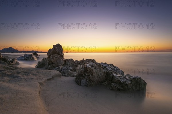 The sun rises on the Costa Rei, a stretch of coastline on the Italian Mediterranean island of