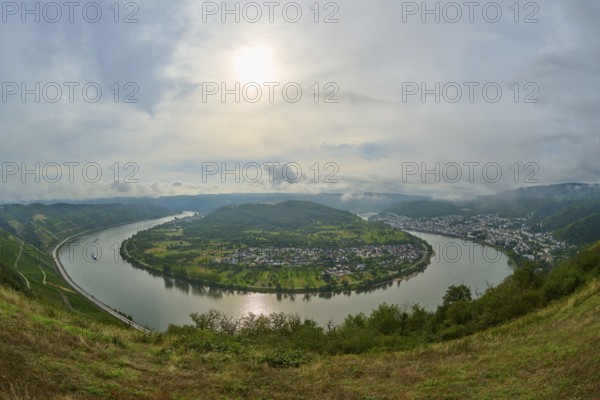 Impressive river landscape with valley, hills and cloudy sky in sunshine, summer, Rhine bend