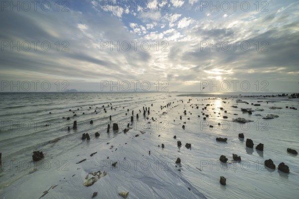 Structures in the sand at sunrise on Sivalai Beach, Koh Mook Island, Satun Province, Southern