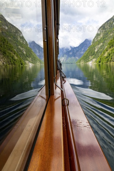Mountains and lake reflected in the windscreen of the excursion boat at Königssee, Berchtesgaden