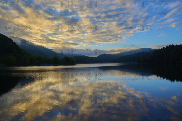 Lake with impressive cloud formations reflected in the water, summer, Rursee, Obersee, Rurberg,
