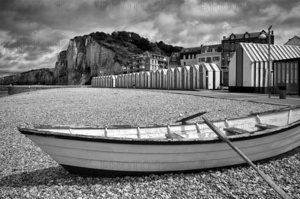 Rowing boat on the beach, pebble beach, beach huts, beach cabins, bathing cabins, cabins, black and