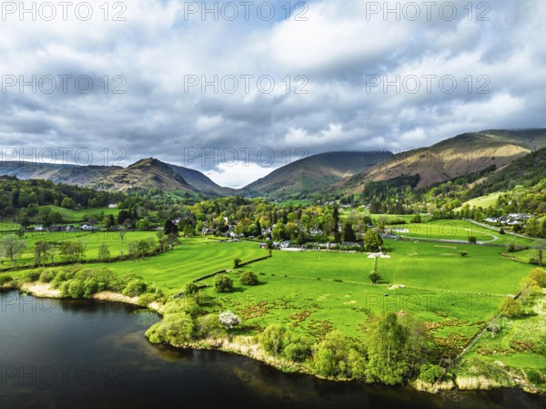 Farms and Mountains over road A591 from a drone, Grasmere Lake, Grasmere, Ambleside, Lake District,