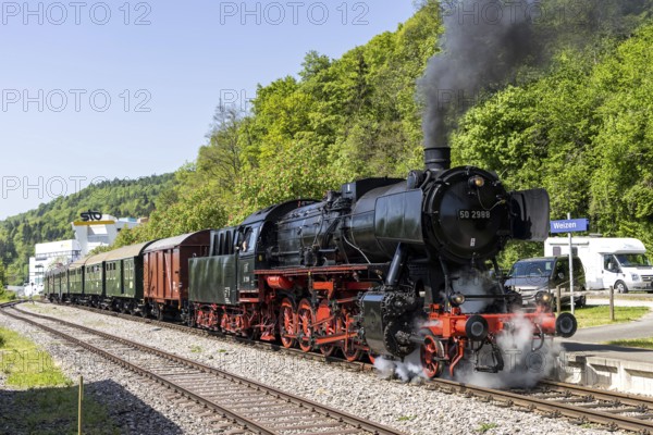 Steam train of the Sauschwänzlebahn steam railway railway steam locomotive at Weizen station,