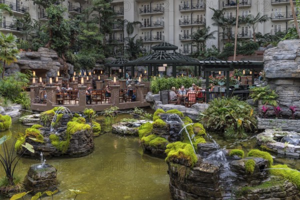 Guests dining at the Cascades American Cafe inside Gaylord Opryland Resort and Convention Center in