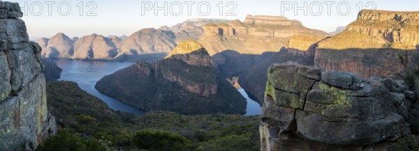 Panorama, sunset at Blyde River Canyon with Three Rondawels peak, view of canyon with Blyde River
